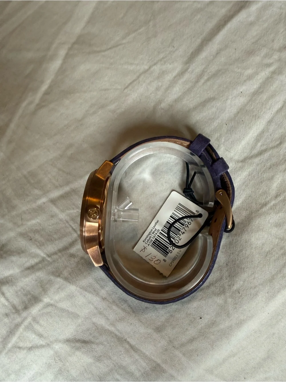 Nixon women’s purple Dial Leather Strap Watch